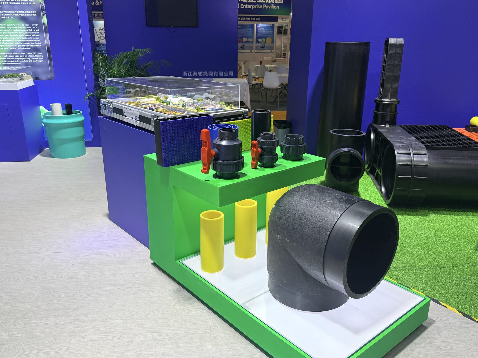Close-up of an HDPE cage array model and PVC-U valves on the ERA display at the Guangzhou Fisheries Expo